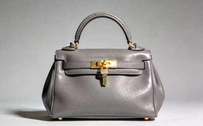 爱马仕Kelly 28 Retourne手提包，经典大象灰Togo皮革，金色五金