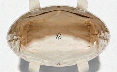 Plain Minimalist Canvas Tote Bag in beige with simple logo and spacious interior