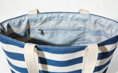 Striped Beach Tote Bag in blue and white with waterproof lining and zip pocket