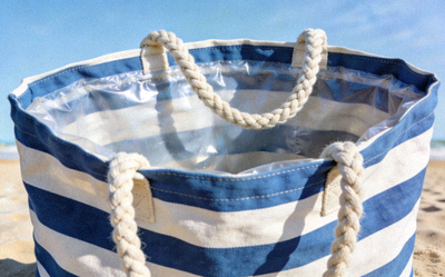 Large Canvas Beach Tote Bag with striped pattern, sturdy handles, and waterproof lining
