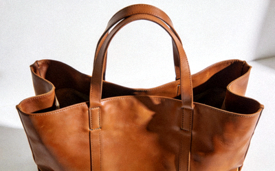 Oversized Leather Shopper Tote in cognac color with open top and side gussets for expansion