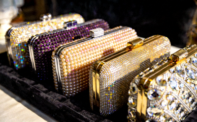 Evening clutches and embellished minaudières with sequins, beads, and metallic finishes